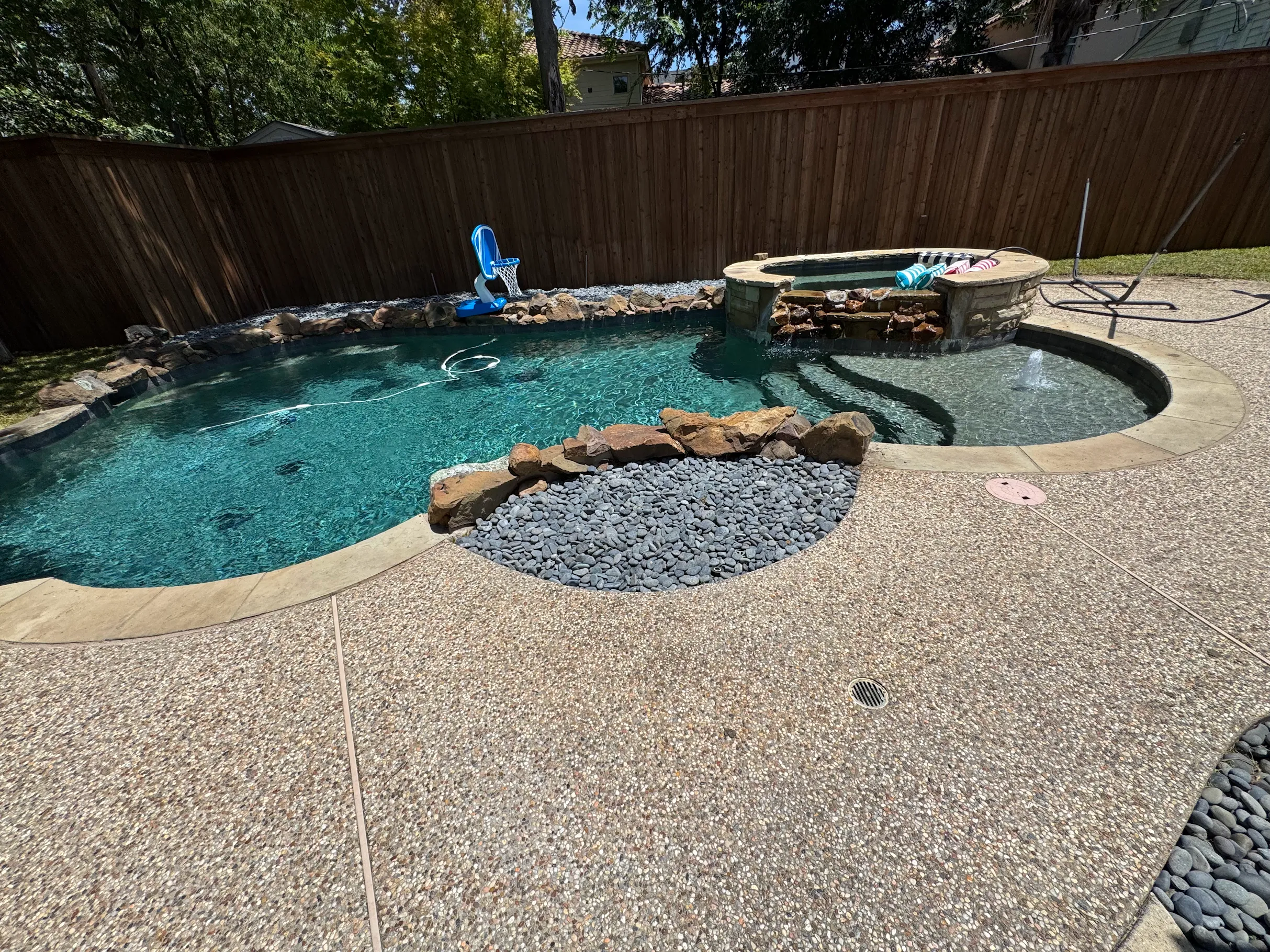 Pool with rock landscaping